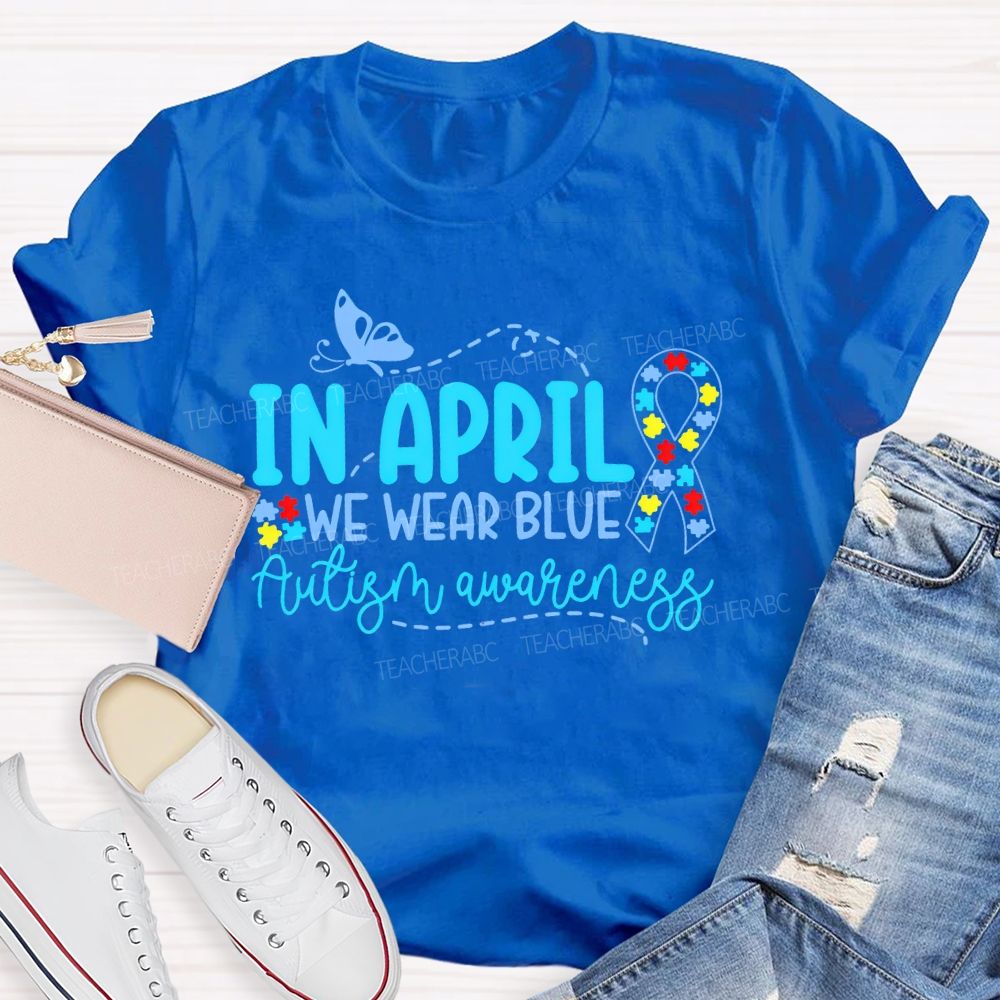 In April We Wear Blue Autism Awareness Puzzle Ribbon Teacher T-shirt