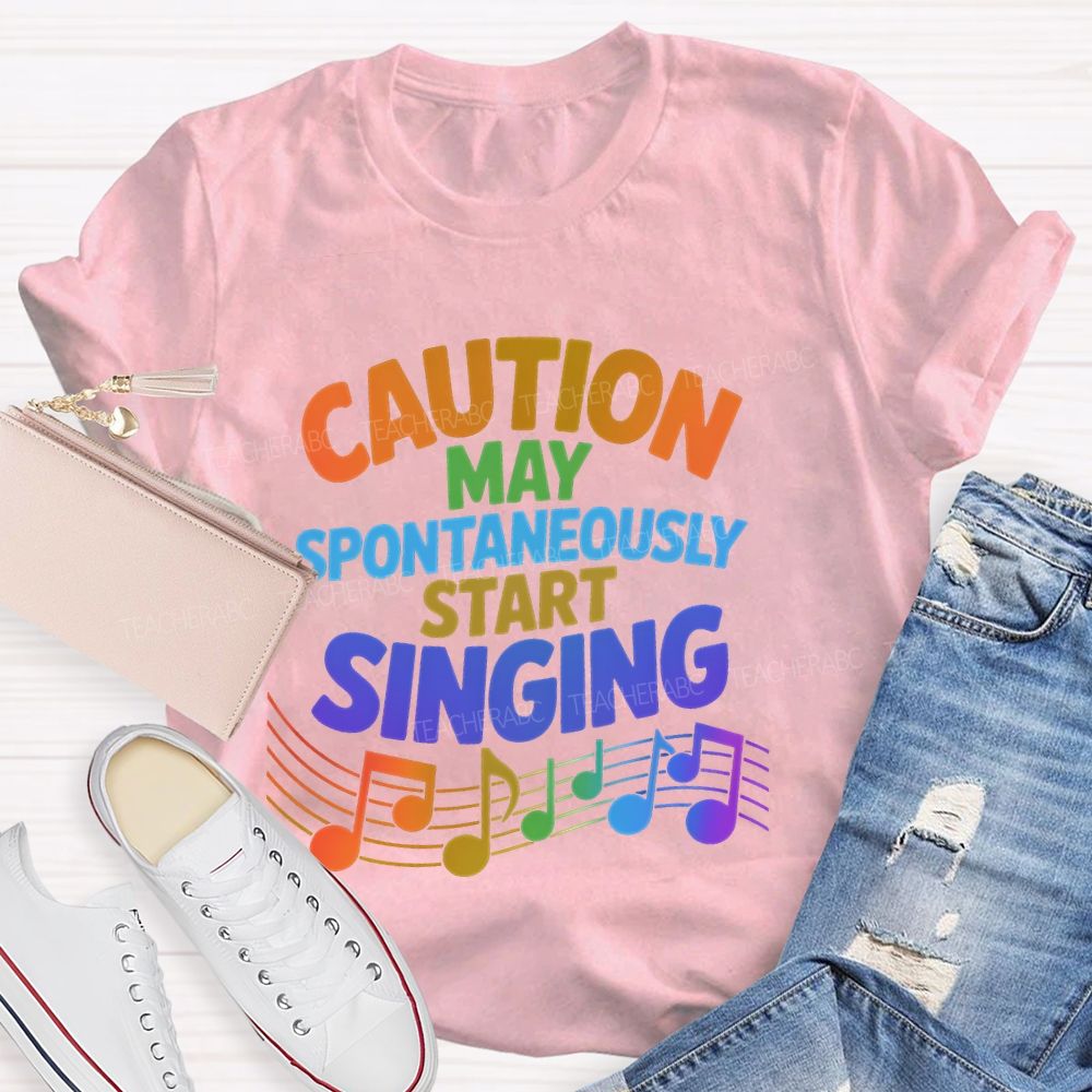 Caution May Spontaneously Start Singing Colorful Letters Teacher T-shirt