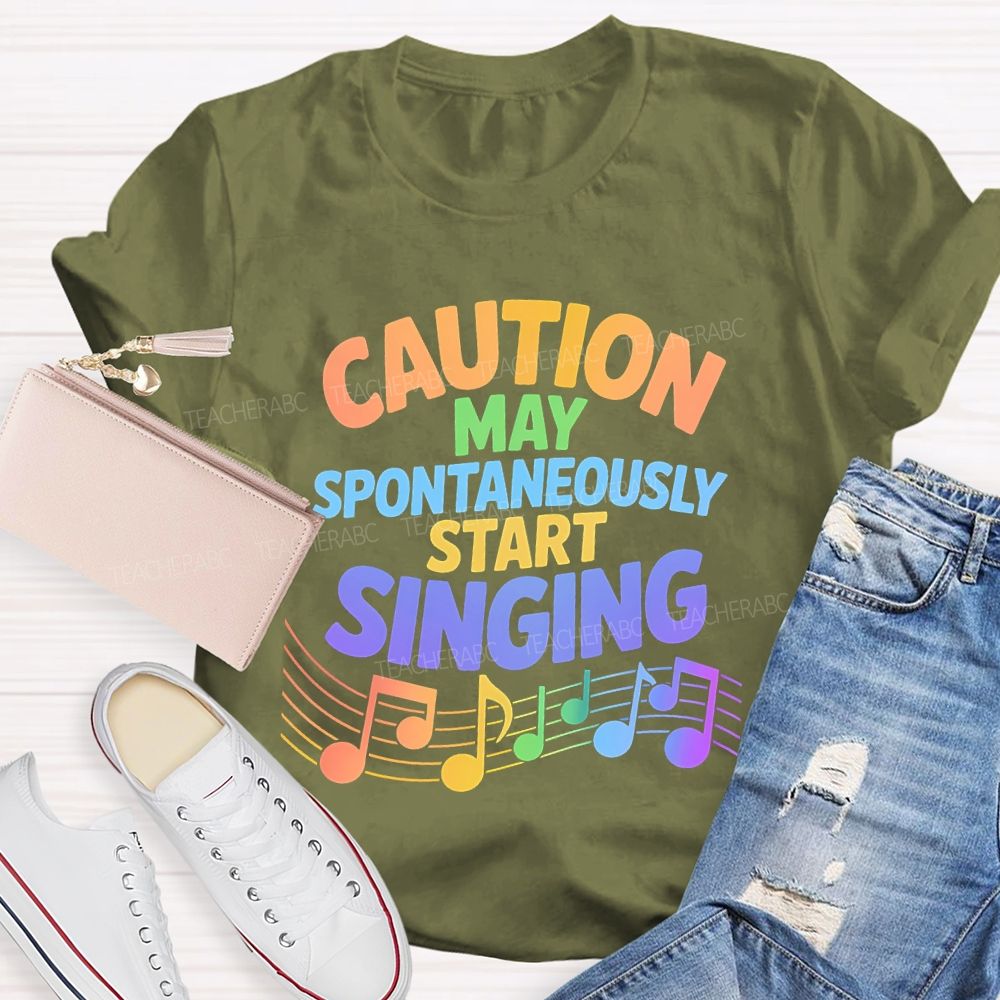 Caution May Spontaneously Start Singing Colorful Letters Teacher T-shirt