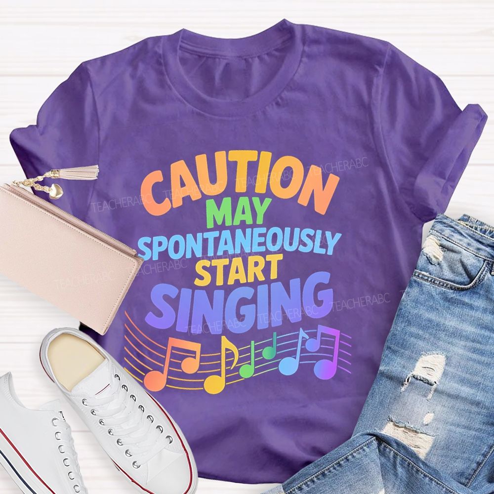 Caution May Spontaneously Start Singing Colorful Letters Teacher T-shirt