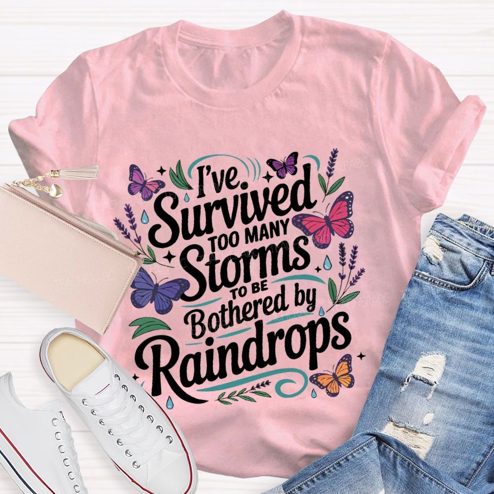 I've Survived Too Many Storms To Be Bothered By Raindrops Teacher T-shirt