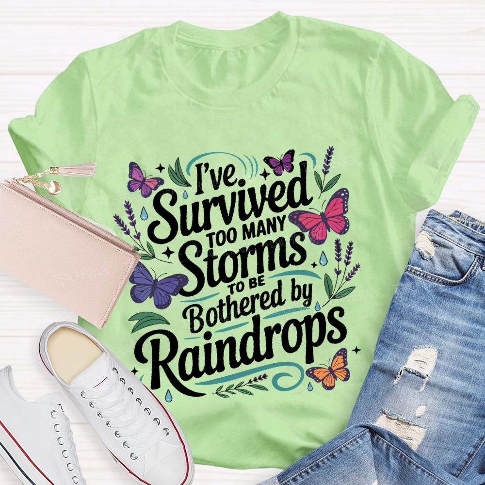I've Survived Too Many Storms To Be Bothered By Raindrops Teacher T-shirt