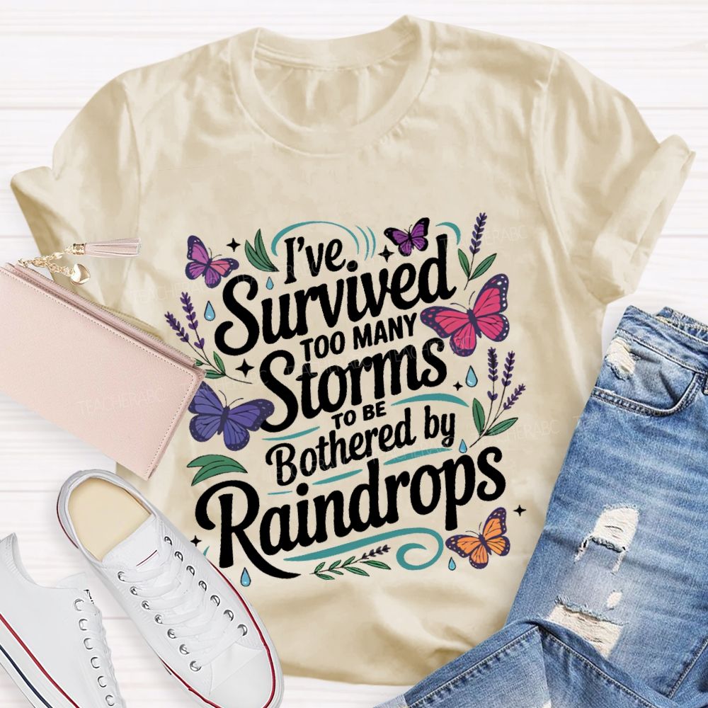 I've Survived Too Many Storms To Be Bothered By Raindrops Teacher T-shirt