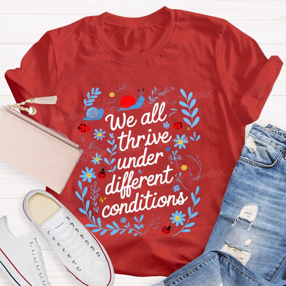 We All Thrive Under Different Conditions Graphic Teacher T-shirt