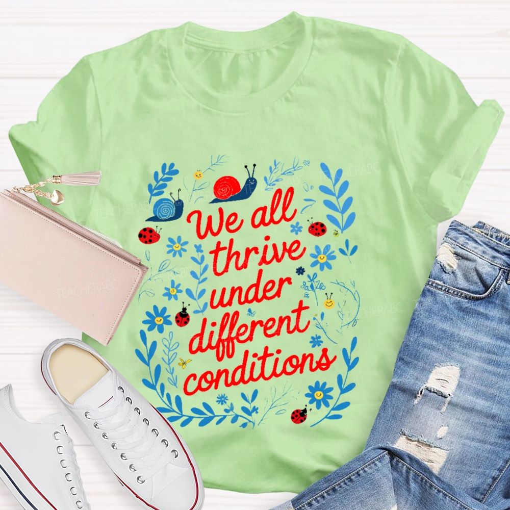 We All Thrive Under Different Conditions Graphic Teacher T-shirt