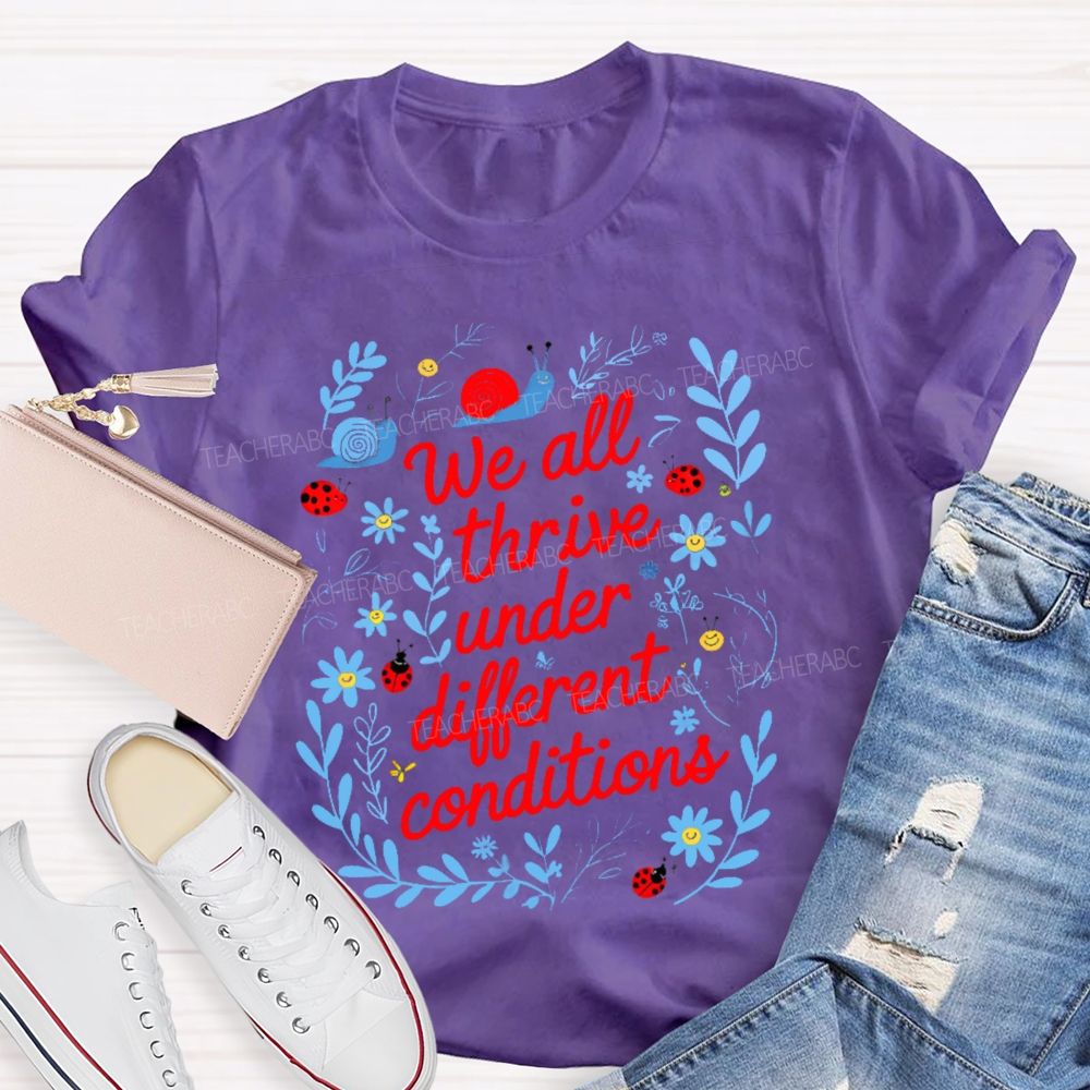 We All Thrive Under Different Conditions Graphic Teacher T-shirt