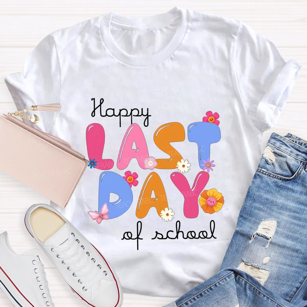 Happy Last Day Of School Small Flowers And Colorful Fonts T-shirt