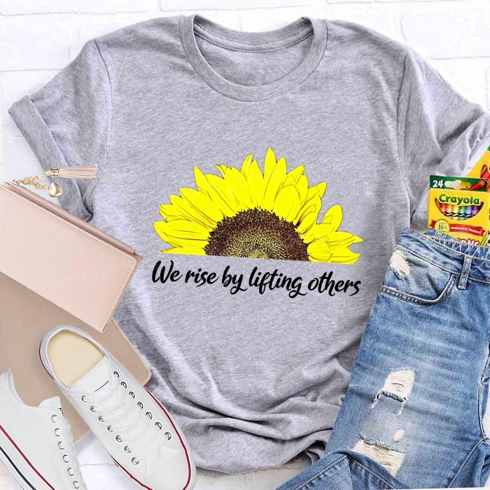 The Rise By Lifting Others Teacher T-shirt
