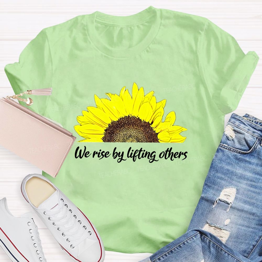 The Rise By Lifting Others Teacher T-shirt