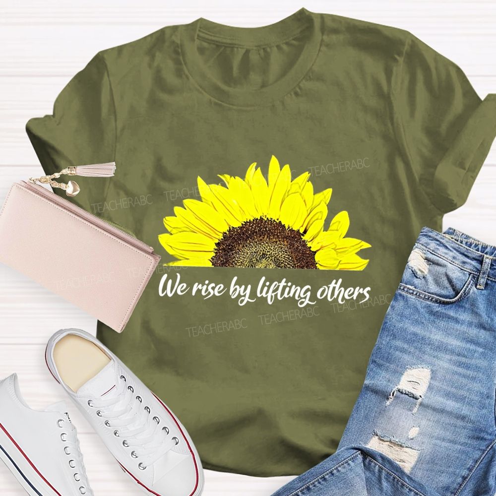 The Rise By Lifting Others Teacher T-shirt