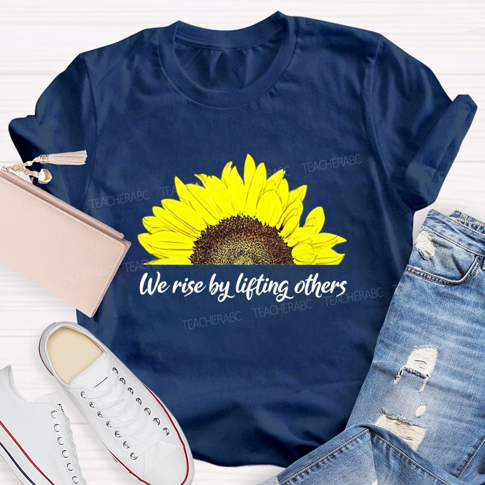The Rise By Lifting Others Teacher T-shirt