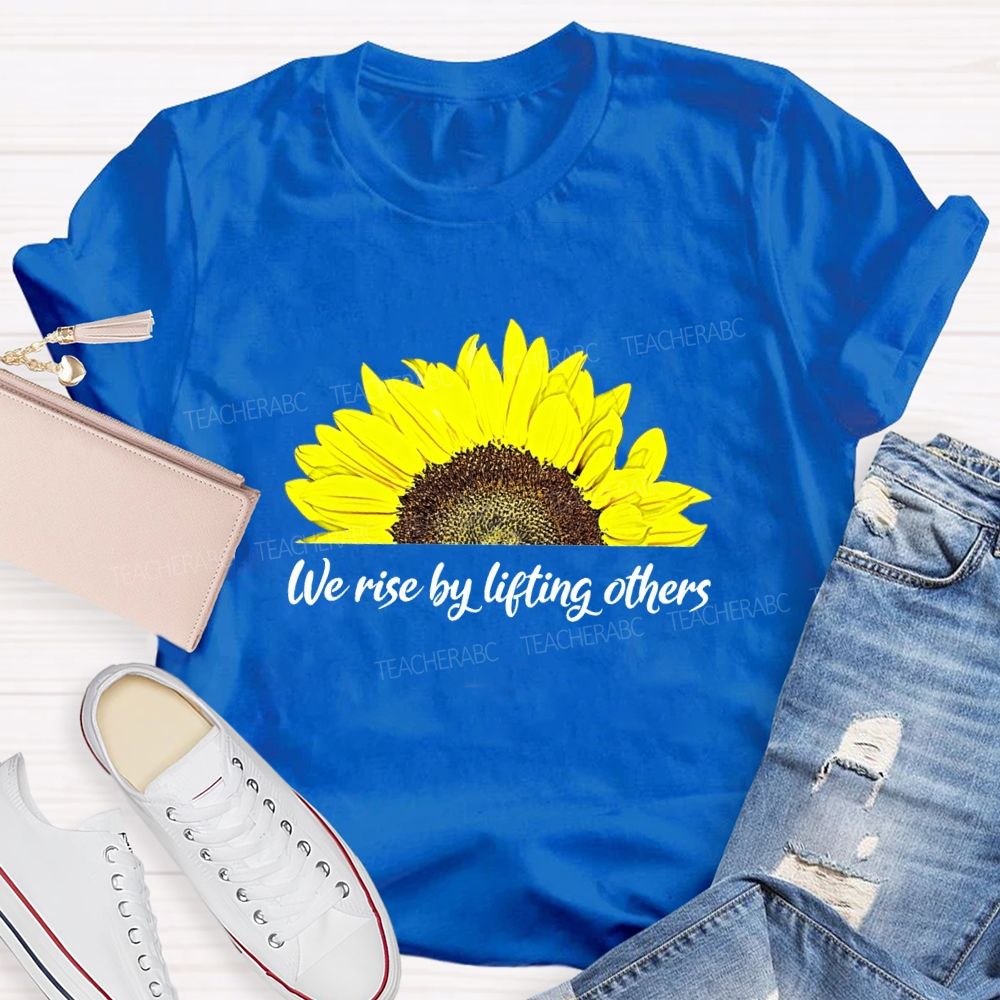 The Rise By Lifting Others Teacher T-shirt