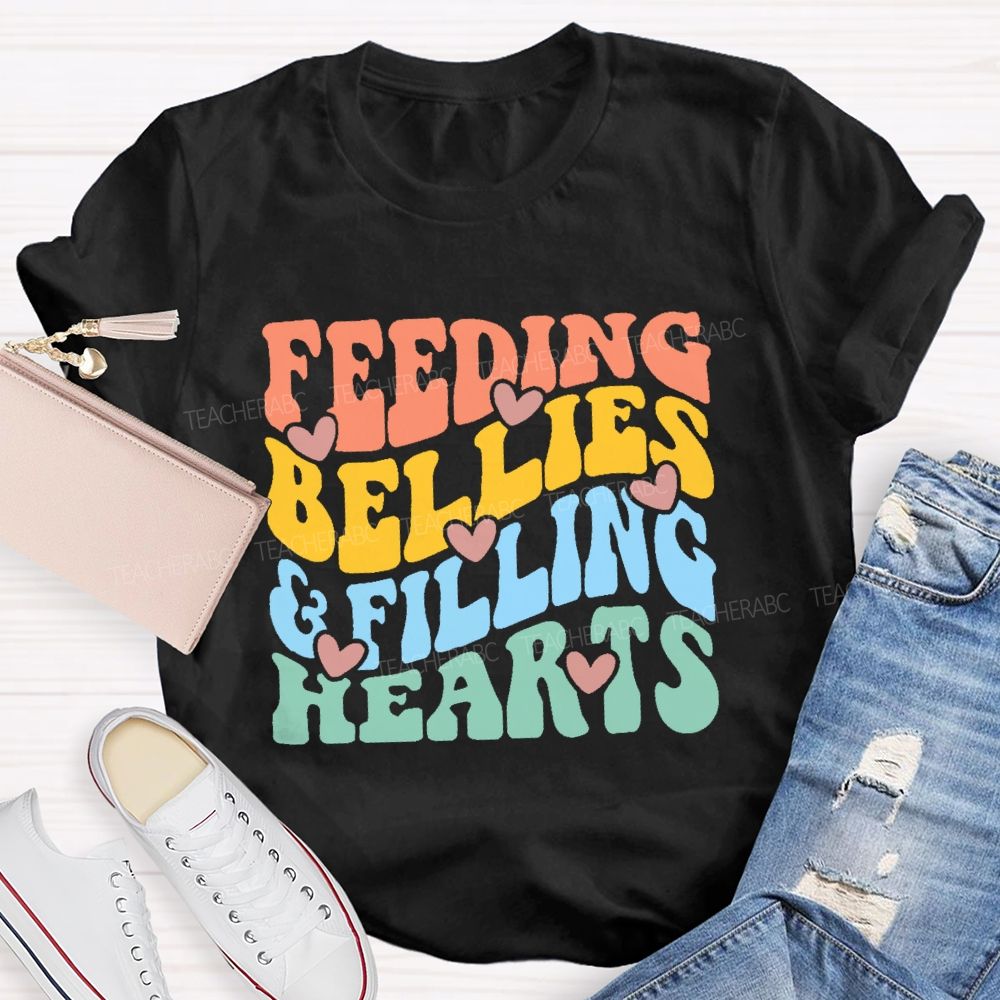 Feeding Bellies Filling Hearts Colorful Letters Teacher T-shirt