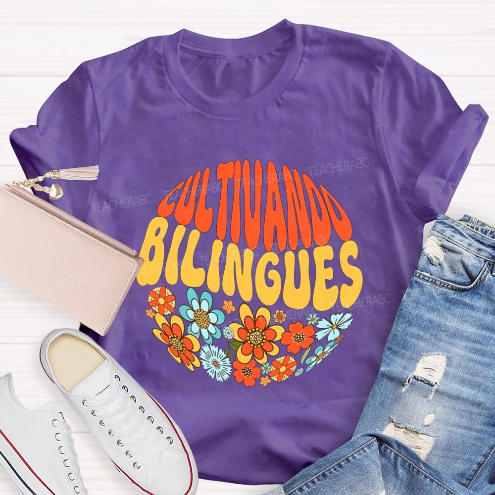 Cultivando Bilingues And Colorful Flowers Teacher T-shirt