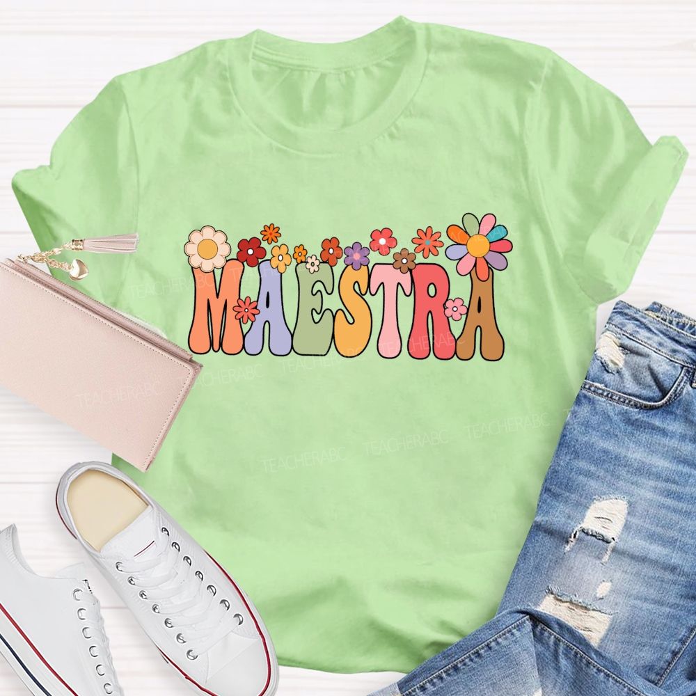 Maestra Colorful Fonts And Small Flowers Teacher T-shirt