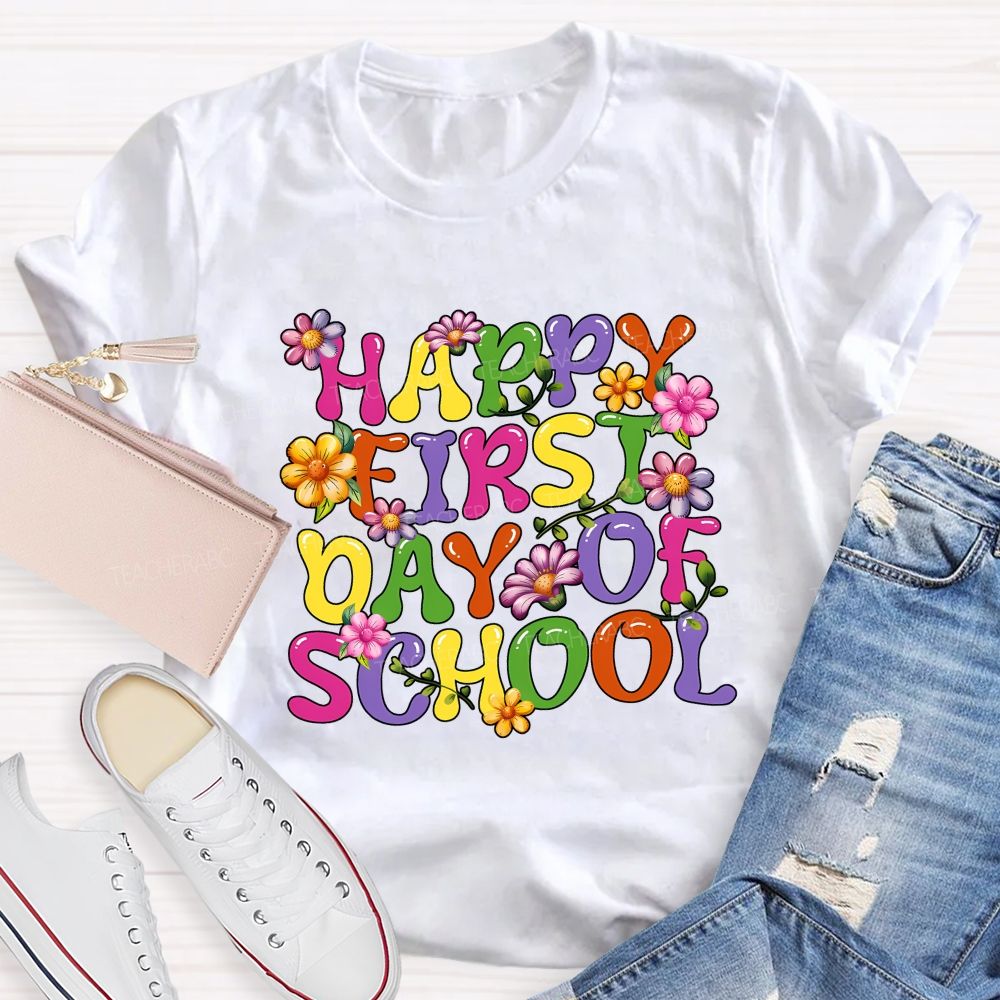 Happy First Day Of School Colorful Fonts And Flowers Teacher T-shirt