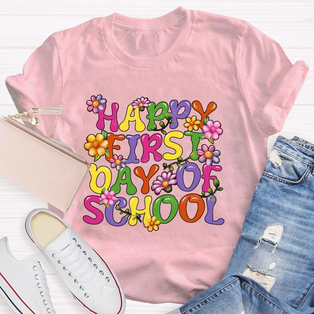 Happy First Day Of School Colorful Fonts And Flowers Teacher T-shirt