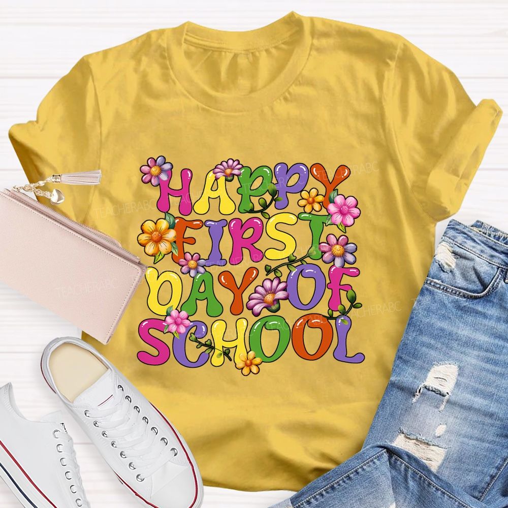 Happy First Day Of School Colorful Fonts And Flowers Teacher T-shirt