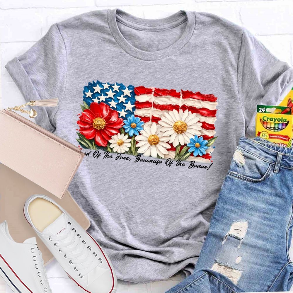 Land Of The Free Because Of The Brave Flowers Letters Patterns Teacher T-shirt