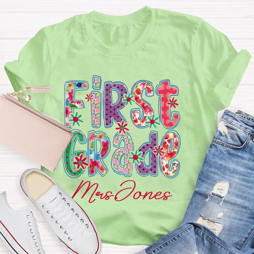 Personalized Name And Grade First Grade Flowers Letters Teacher T-shirt