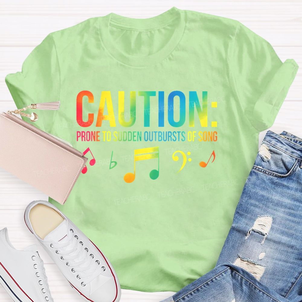 Caution Prone To Sudden Outbursts Of Song Colorful Letters Teacher T-shirt