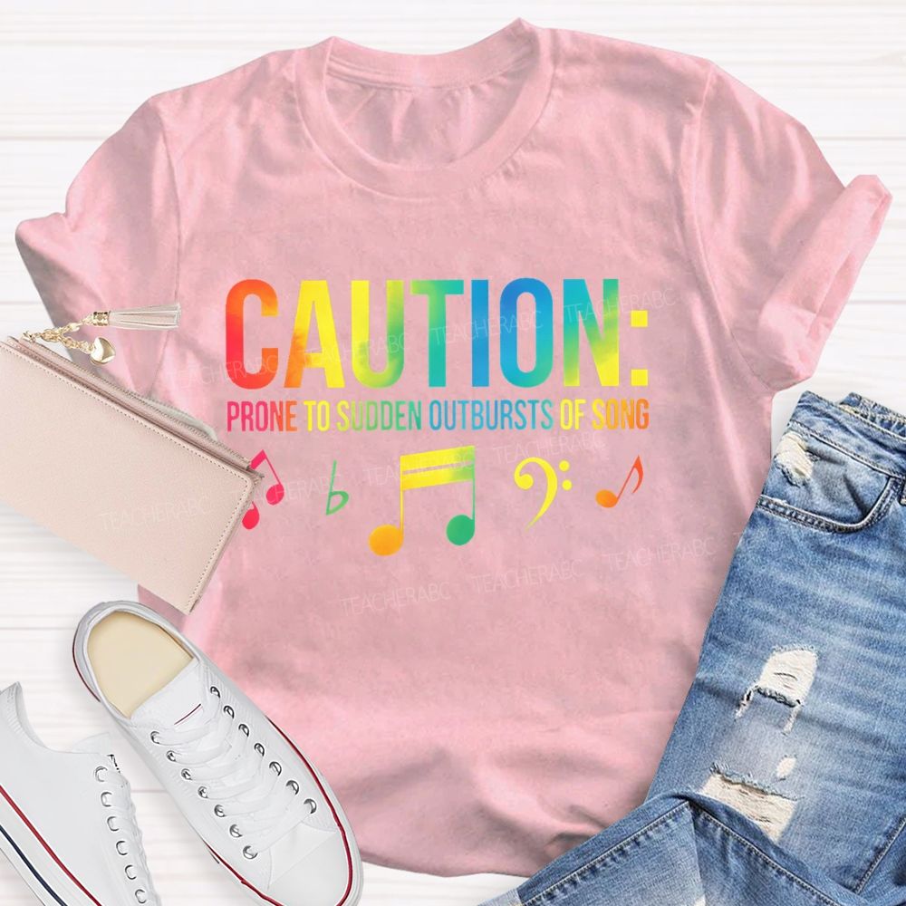 Caution Prone To Sudden Outbursts Of Song Colorful Letters Teacher T-shirt
