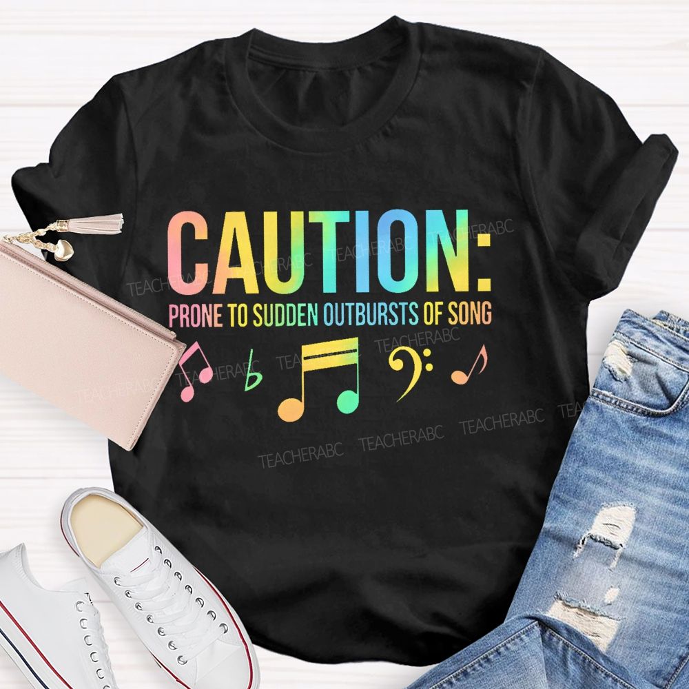 Caution Prone To Sudden Outbursts Of Song Colorful Letters Teacher T-shirt