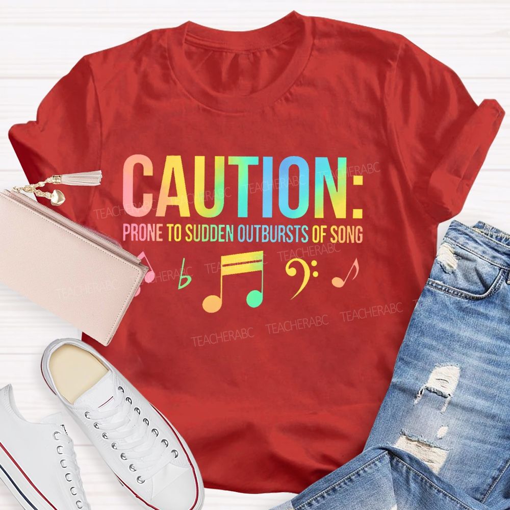 Caution Prone To Sudden Outbursts Of Song Colorful Letters Teacher T-shirt