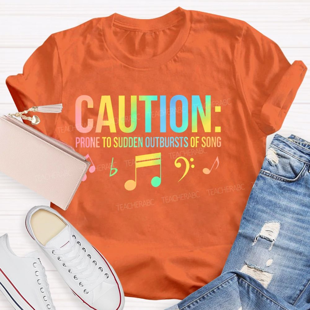 Caution Prone To Sudden Outbursts Of Song Colorful Letters Teacher T-shirt