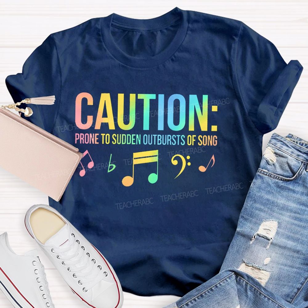Caution Prone To Sudden Outbursts Of Song Colorful Letters Teacher T-shirt