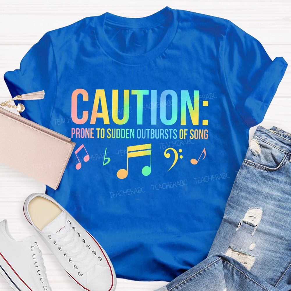 Caution Prone To Sudden Outbursts Of Song Colorful Letters Teacher T-shirt