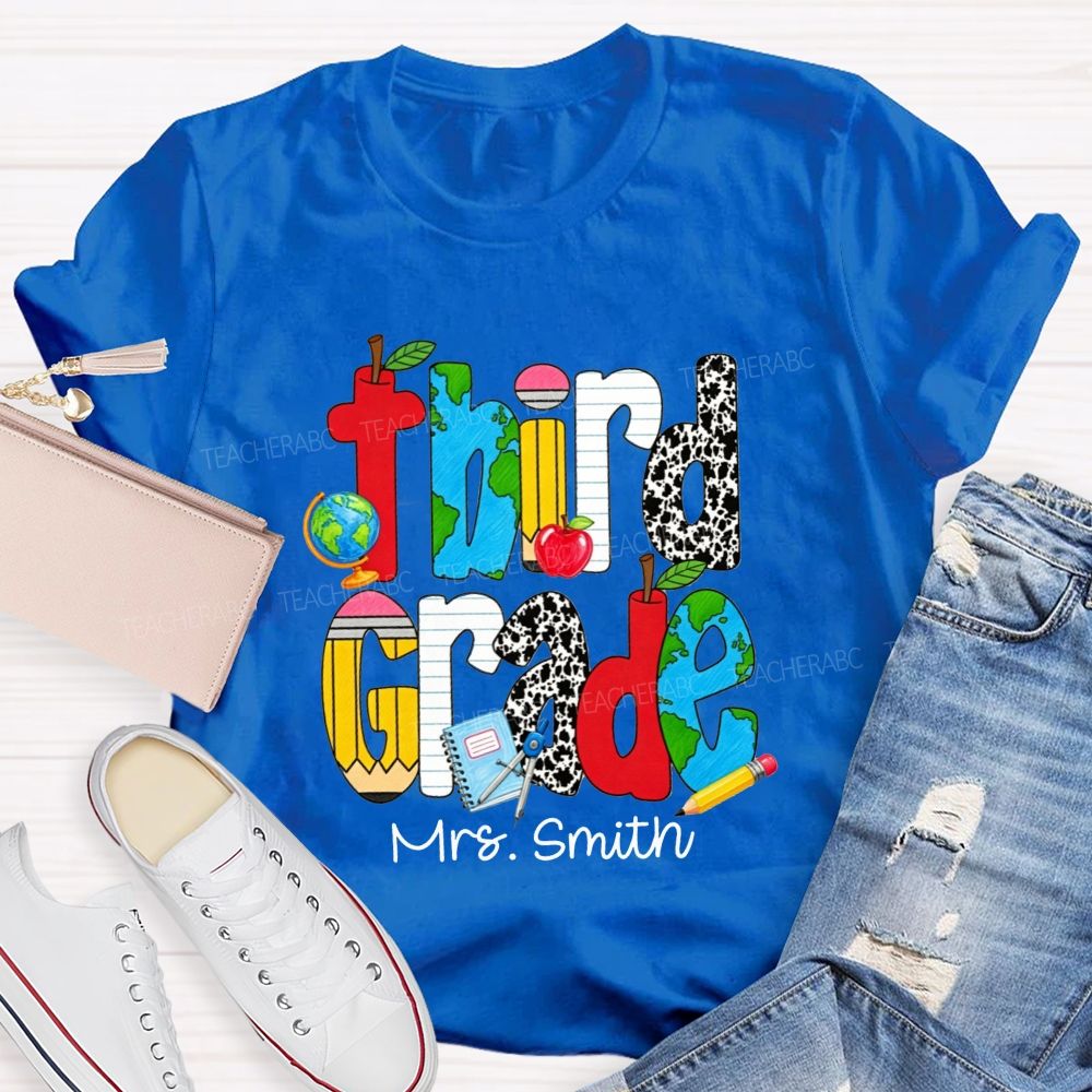 Personalized Name And Grade Cow Print And School‑Supply Doodle Teacher T-shirt