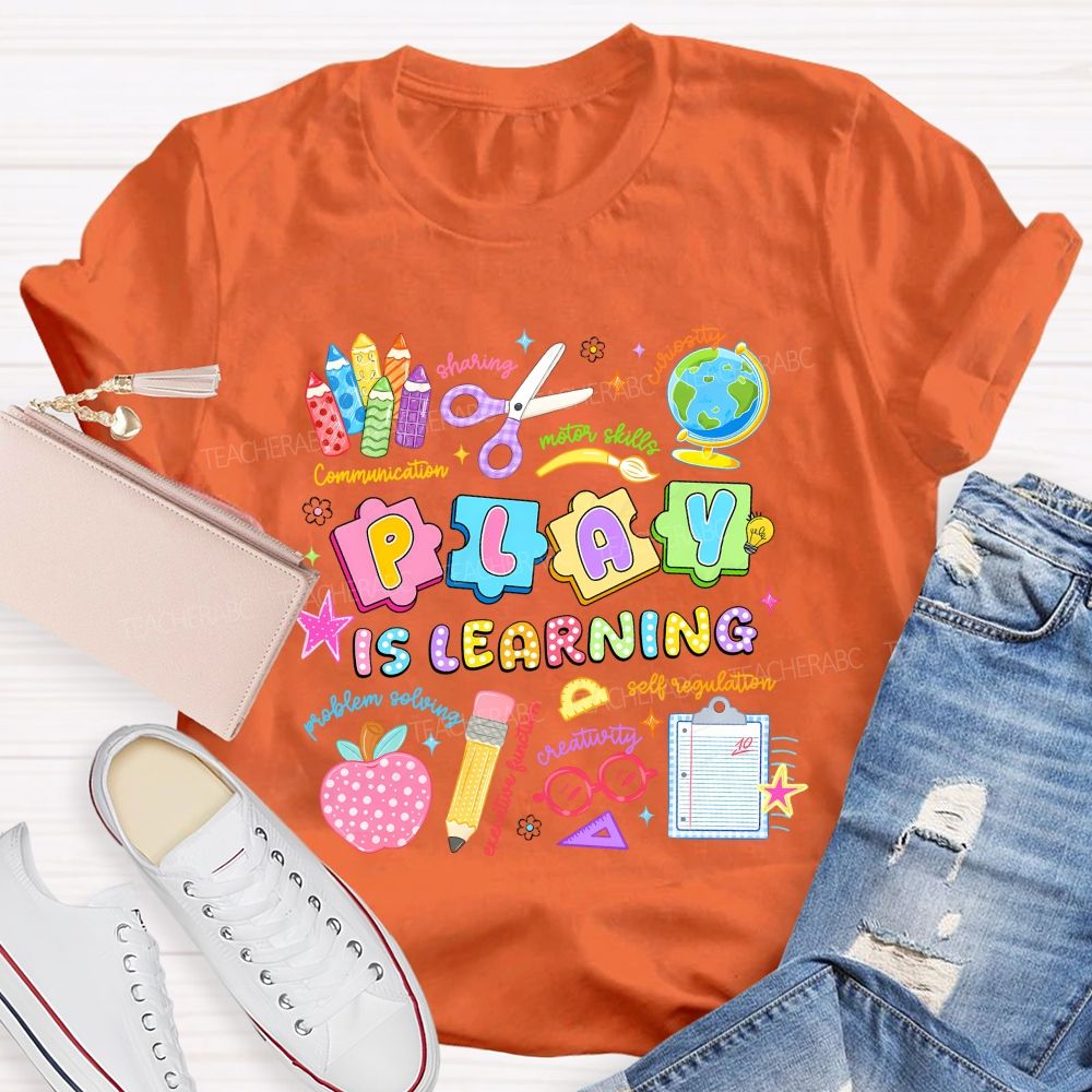 Play Is Learning Sharing Curiosity Motor Skills Communication Problem Solving Teacher T-shirt