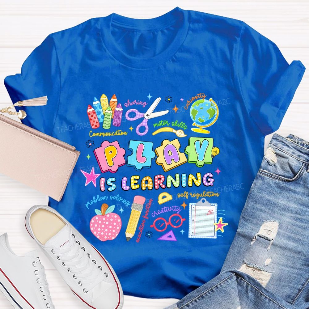Play Is Learning Sharing Curiosity Motor Skills Communication Problem Solving Teacher T-shirt