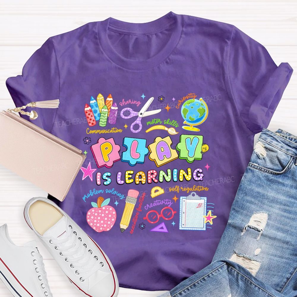 Play Is Learning Sharing Curiosity Motor Skills Communication Problem Solving Teacher T-shirt