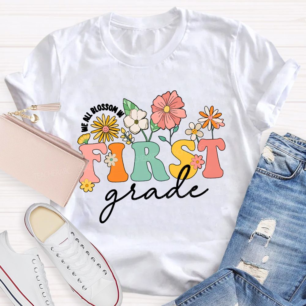 Personalized Grade We All Blossom In First Grade Floral Teacher T-Shirt
