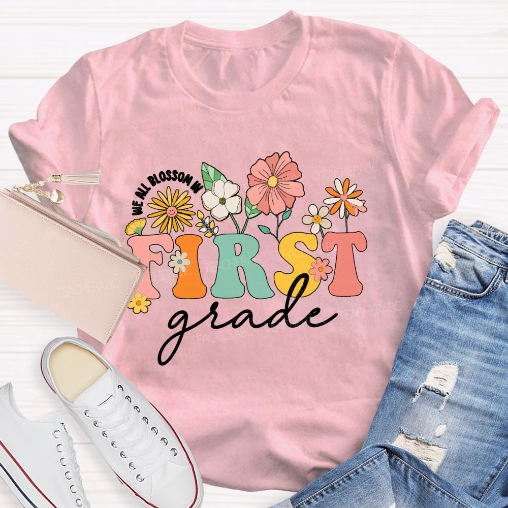 Personalized Grade We All Blossom In First Grade Floral Teacher T-Shirt