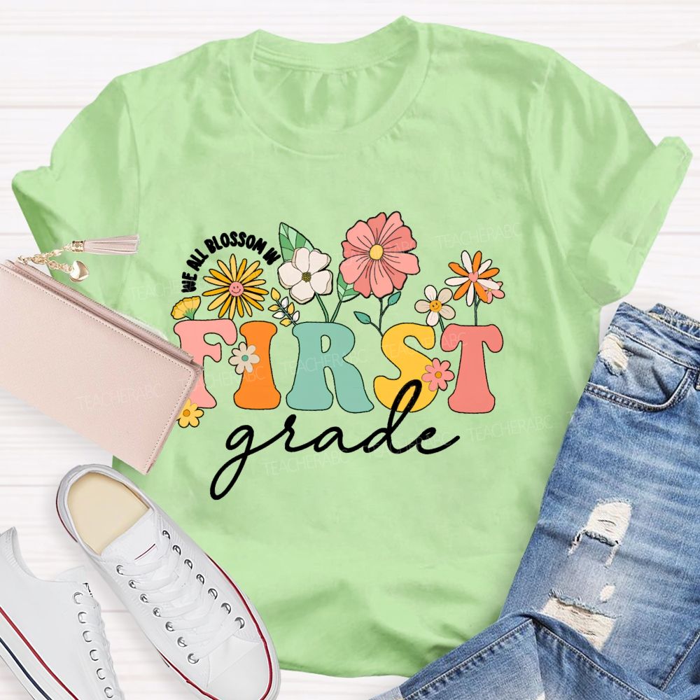 Personalized Grade We All Blossom In First Grade Floral Teacher T-Shirt