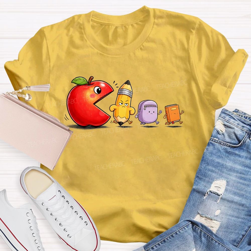 Funny Scene Of An Apple Chasing A Pencil And A Schoolbag.Back To School Teacher T-shirt