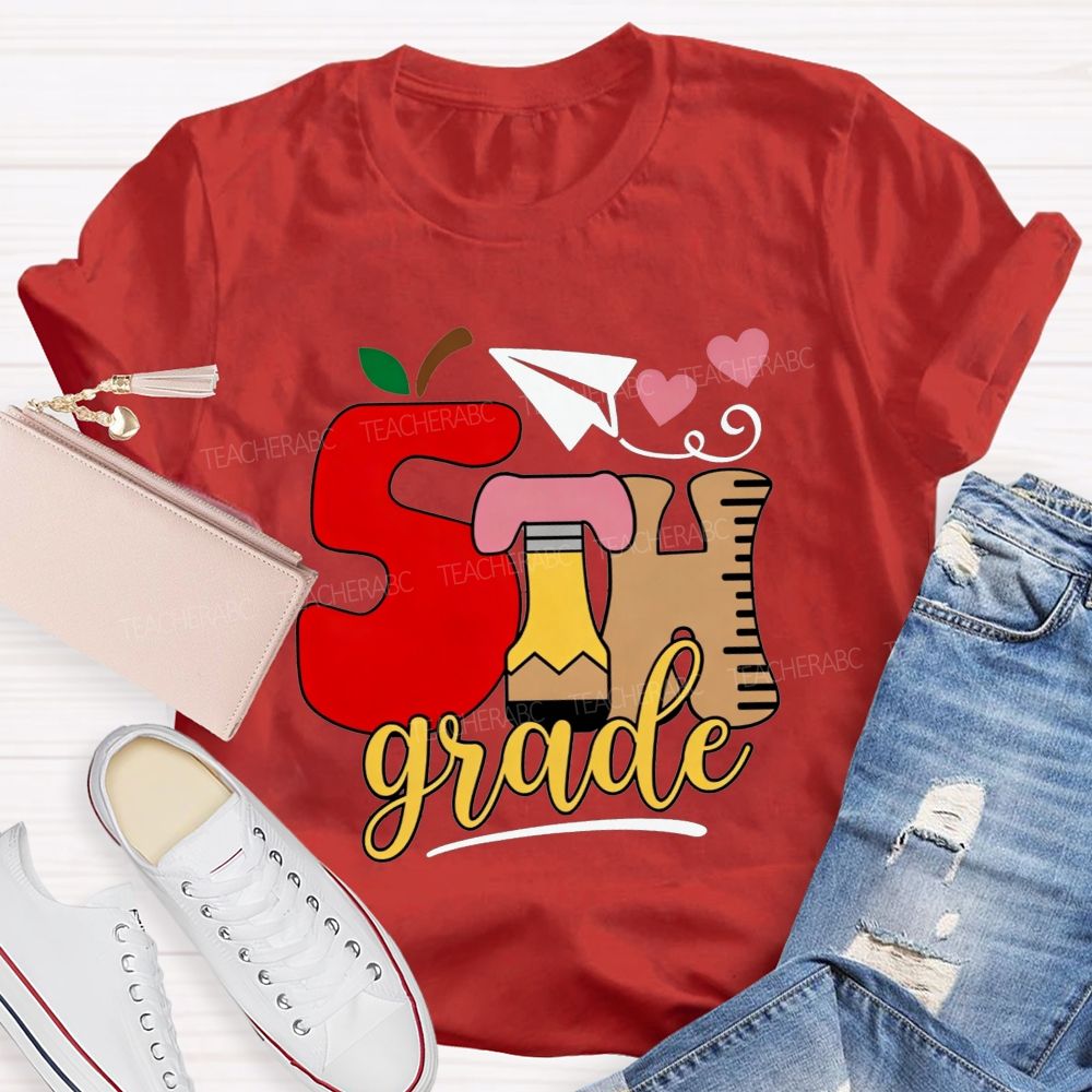 Personalized Grade 5th Grade Apple Pencil Ruler Paper Plane Heart Teacher T-shirt