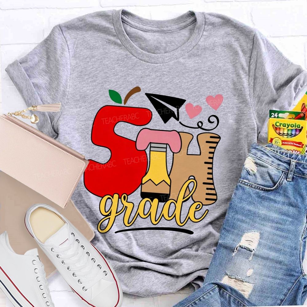 Personalized Grade 5th Grade Apple Pencil Ruler Paper Plane Heart Teacher T-shirt