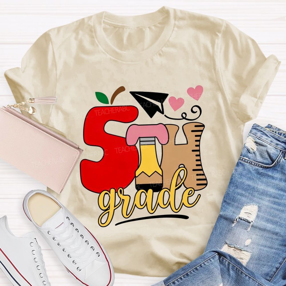 Personalized Grade 5th Grade Apple Pencil Ruler Paper Plane Heart Teacher T-shirt