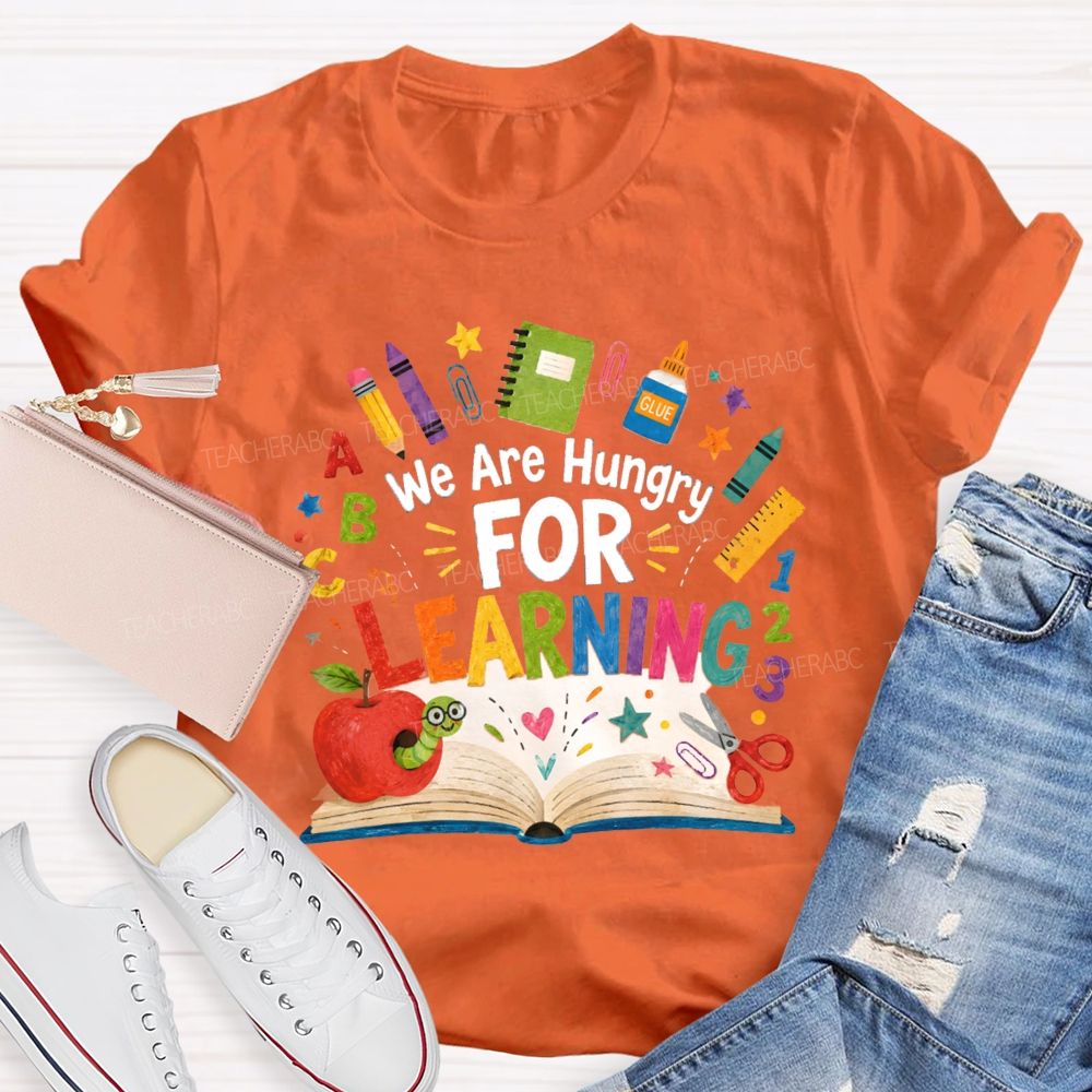 We Are Hungry For Learning The Caterpillar Eating The Apple Teacher T-Shirt