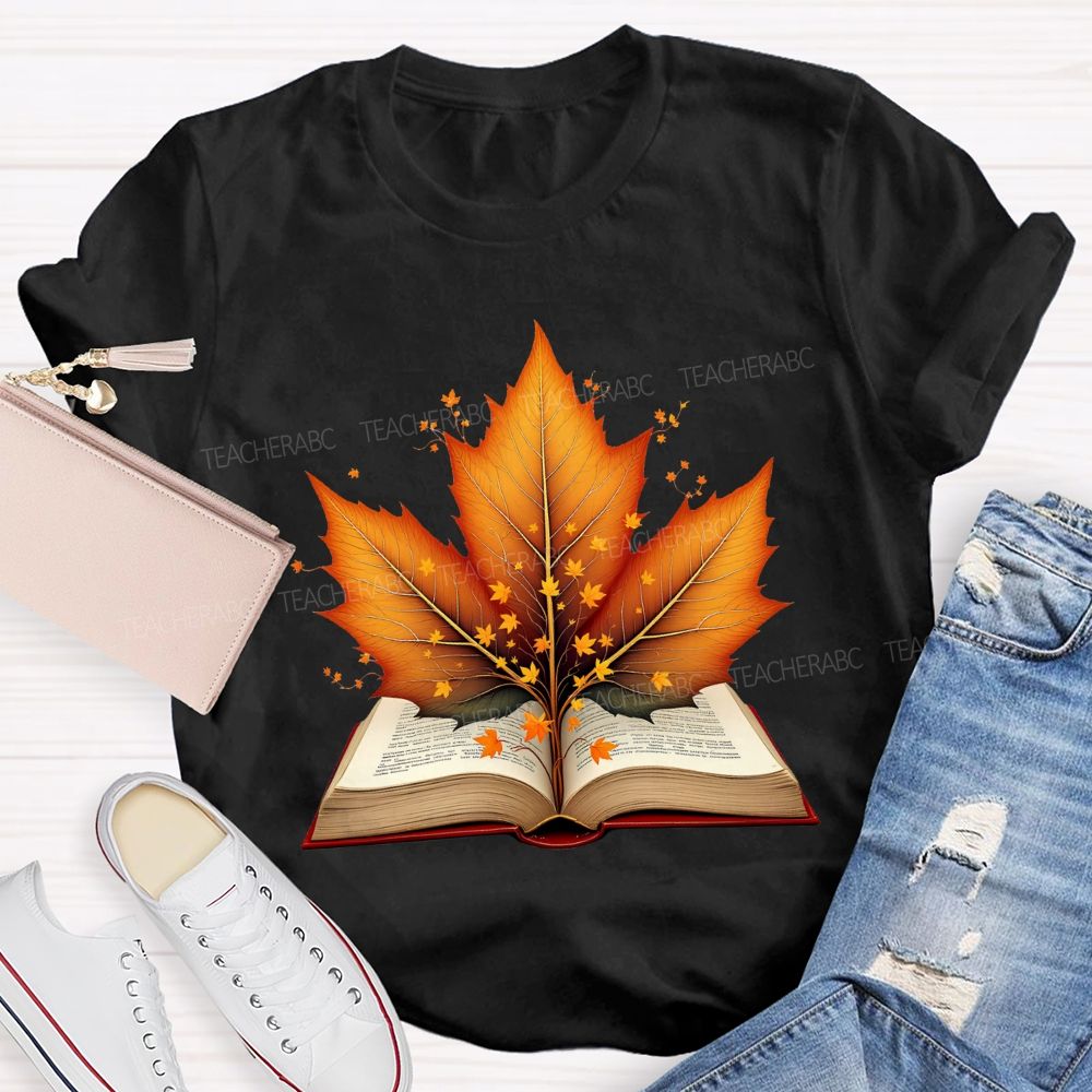 Books And Autumn Leaves Reading Brings Autumn Teacher T-shirt