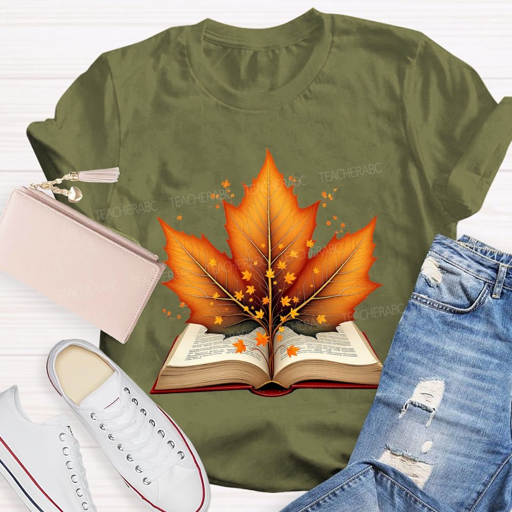 Books And Autumn Leaves Reading Brings Autumn Teacher T-shirt