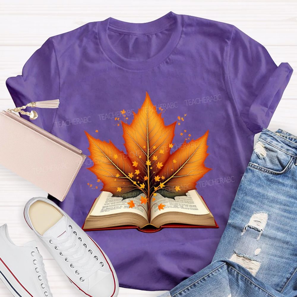Books And Autumn Leaves Reading Brings Autumn Teacher T-shirt