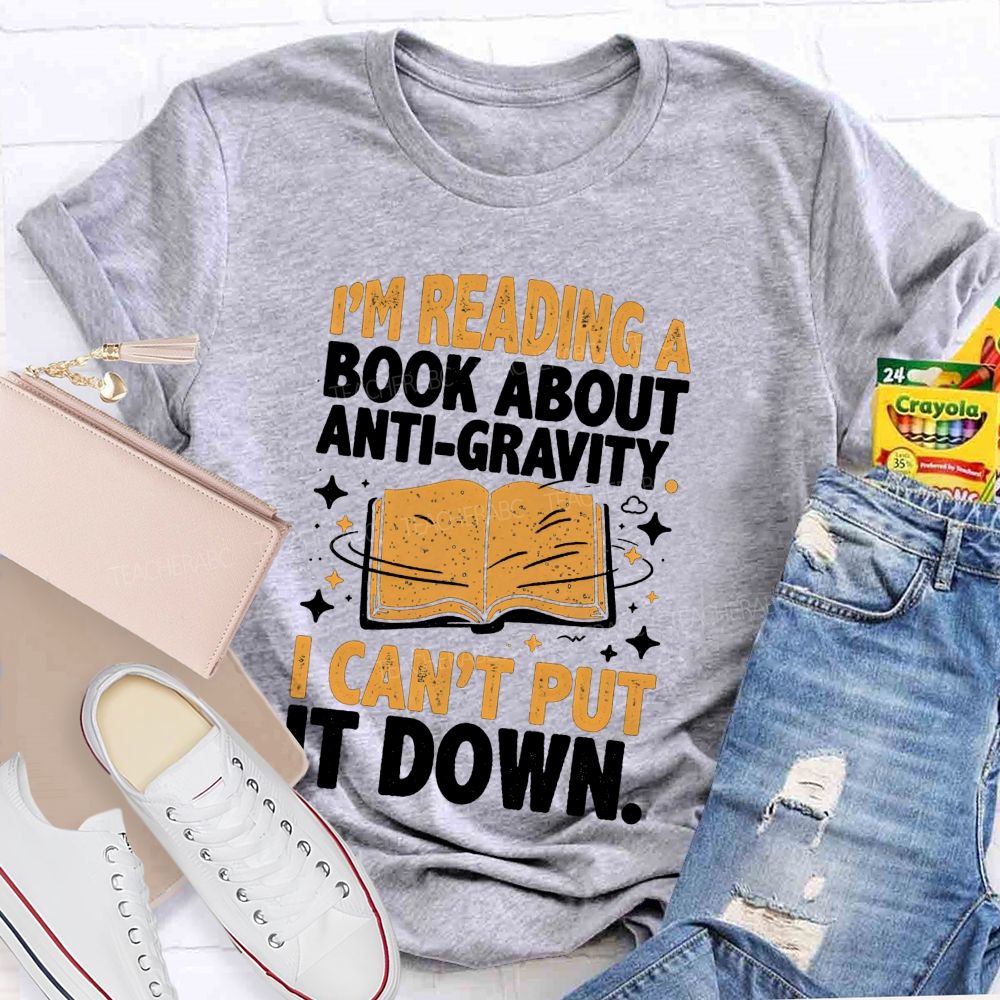 I'M Reading A Book About Anti‑Gravity I Can'T Put It Down Teacher T-shirt