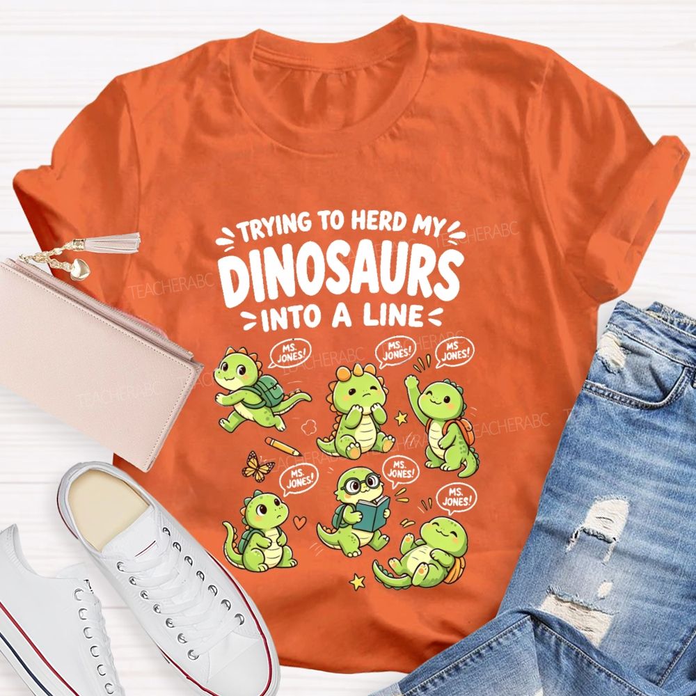 Personalized Name Trying To Herd My Dinosaurs Into A Line Teacher T-Shirt