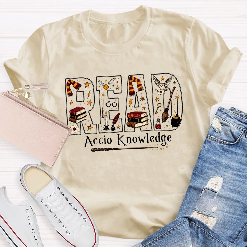 Read Accio Knowledge Halloween Teacher T-shirt