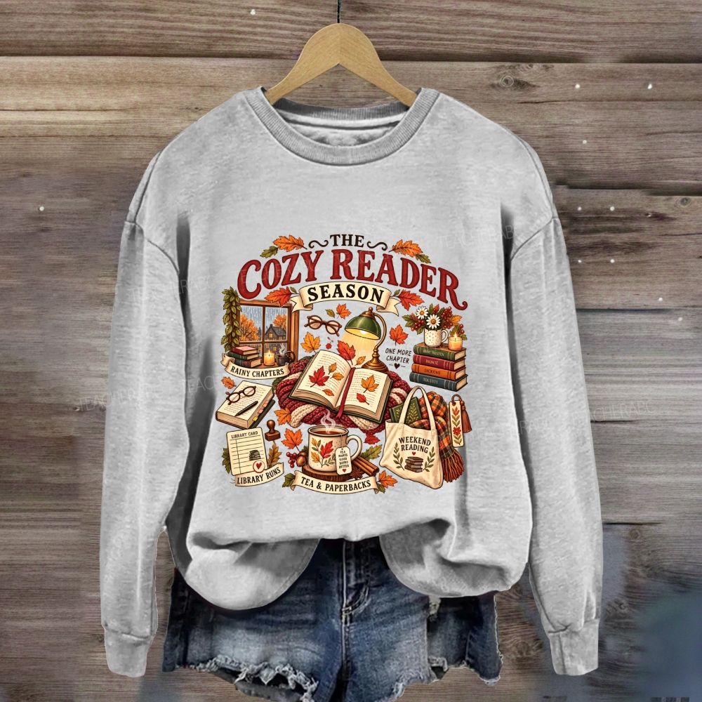 The Cozy Reader Season Rainy Chapters Library Runs Sweatshirt